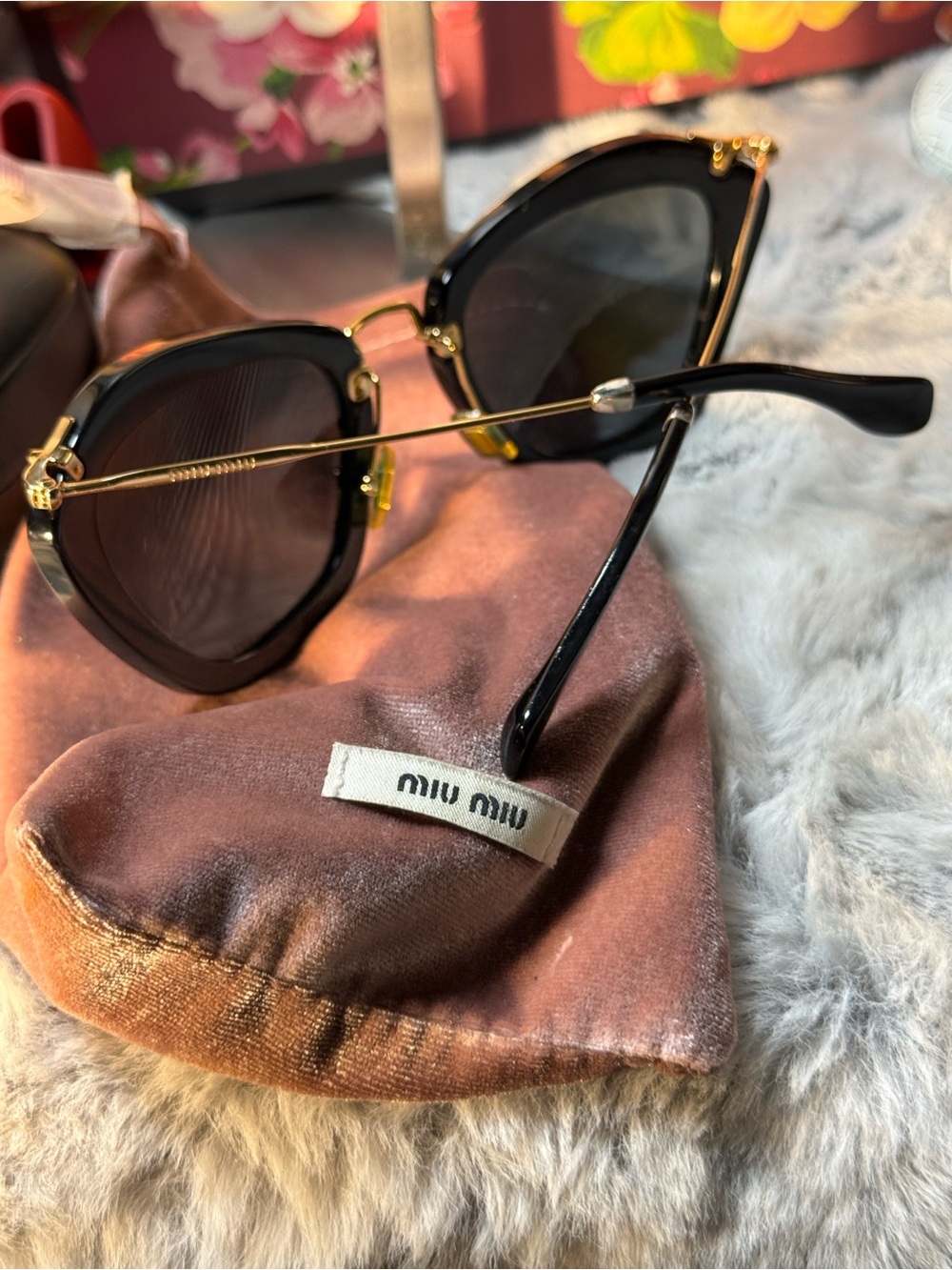 Miu Miu Black Cat-Eye Sunglasses with Gold Trim - Picture 9 of 12